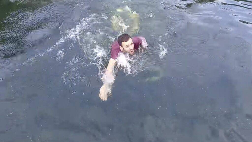 Man saving his drone from crashing in water in last moment.