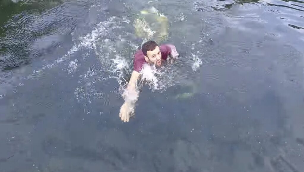 Man saving his drone from crashing in water in last moment.