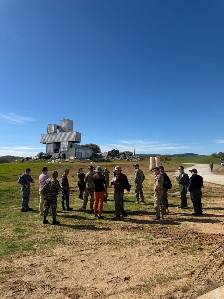 Group of individuals  in their Hardware investing session in the field.